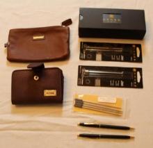 Pair of Black and Gold Cross Pens with Refills and Wallets
