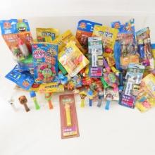 PEZ dispensers and candy some NIP